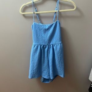 Wildfable blue backless romper. size small